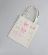About A Girl Bow Canvas Tote Bag