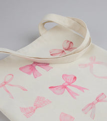 About A Girl Bow Canvas Tote Bag